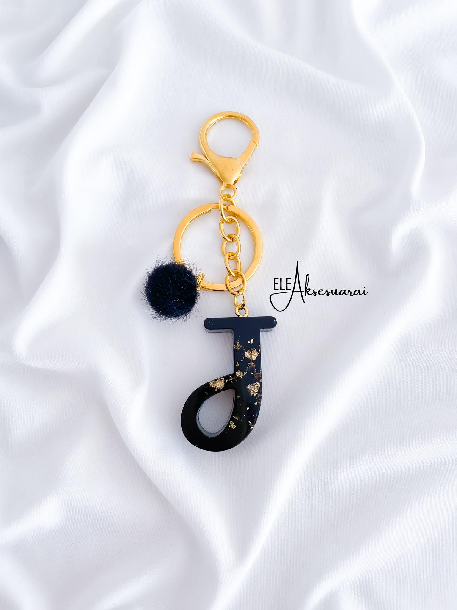 Raktų pakabukai "Epo raidė"